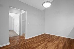 684 Old Dover Rd, Westerville, OH 43082 - spare room featuring wood finished floors and baseboards