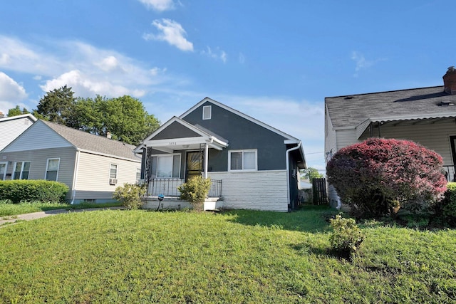 1458 E 22nd Ave, Columbus, OH 43211 - view of front facade with a front yard