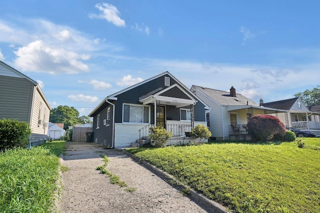 1458 E 22nd Ave, Columbus, OH 43211 - bungalow-style home with covered porch and driveway