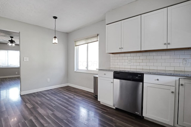 1458 E 22nd Ave, Columbus, OH 43211 - kitchen featuring dishwasher, decorative backsplash, dark wood-style floors, and white cabinets