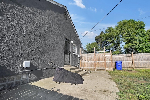 1458 E 22nd Ave, Columbus, OH 43211 - view of side of home featuring stucco siding