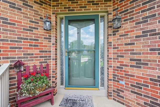 1077 Taylor Mills Dr, Reynoldsburg, OH 43068 - view of exterior entry featuring brick siding