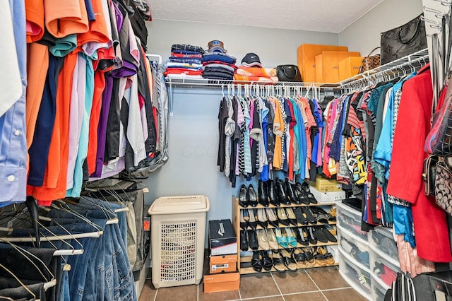 1077 Taylor Mills Dr, Reynoldsburg, OH 43068 - walk in closet with tile patterned flooring