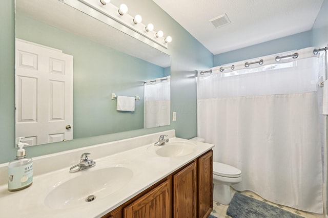 1077 Taylor Mills Dr, Reynoldsburg, OH 43068 - full bath featuring double vanity, a shower with curtain, and tile patterned flooring