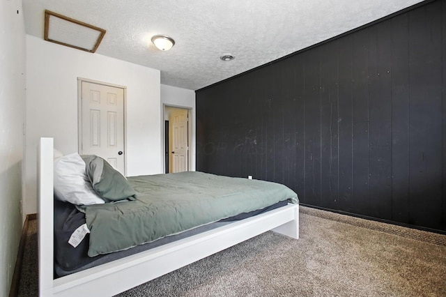 3139 Woonsocket St, Springfield, OH 45503 - carpeted bedroom with attic access and a textured ceiling
