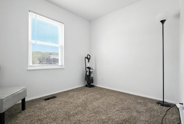 3139 Woonsocket St, Springfield, OH 45503 - carpeted spare room with baseboards