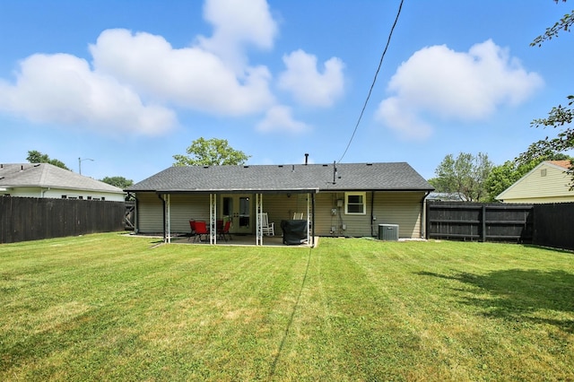 3139 Woonsocket St, Springfield, OH 45503 - back of house featuring a patio, a fenced backyard, and a shingled roof