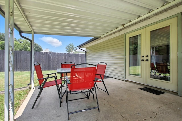 3139 Woonsocket St, Springfield, OH 45503 - view of patio / terrace featuring outdoor dining area and french doors