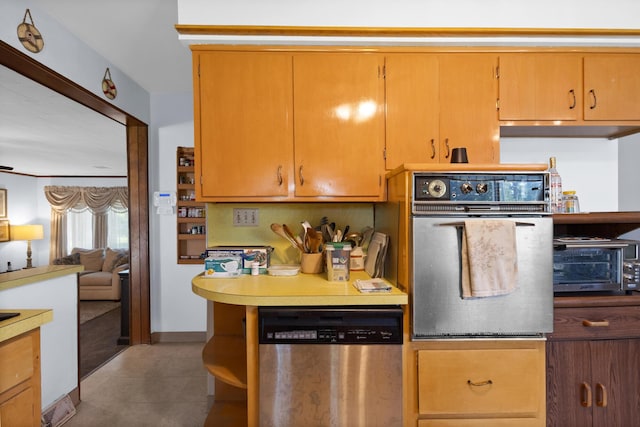 3329 Clime Rd, Columbus, OH 43223 - kitchen featuring dishwasher, oven, light tile patterned floors, and backsplash