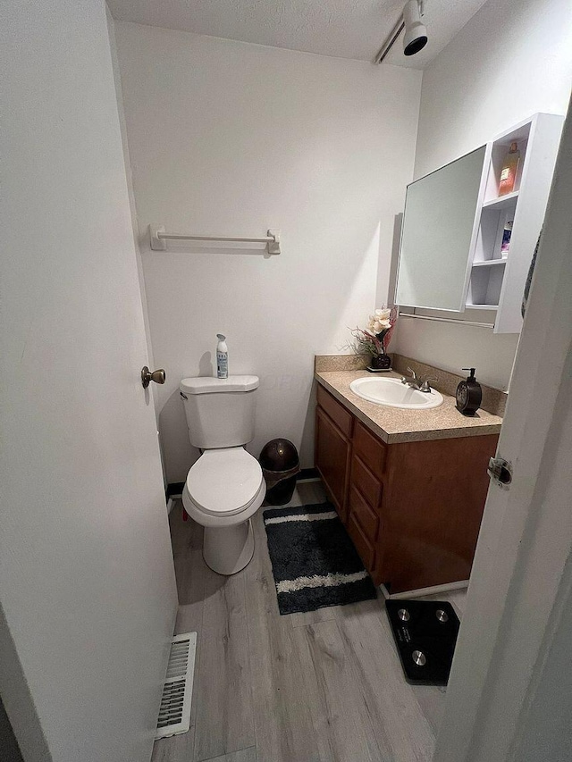 5258 Captains Ct, Columbus, OH 43220 - bathroom featuring vanity and wood finished floors