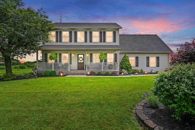 2532 State Route 292, West Mansfield, OH 43358 - colonial inspired home with a porch, a lawn, and a shingled roof