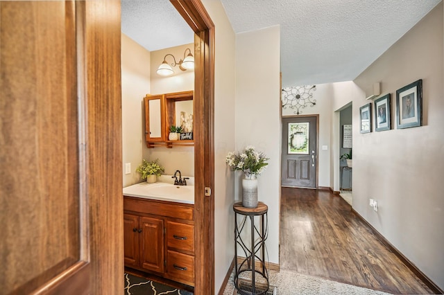 2532 State Route 292, West Mansfield, OH 43358 - bathroom featuring vanity, wood finished floors, and a textured ceiling