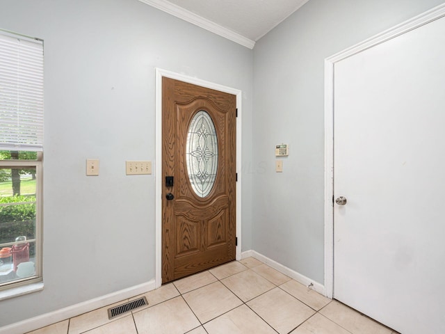 824 Lynnfield Dr, Westerville, OH 43081 - foyer entrance featuring crown molding and light tile patterned floors