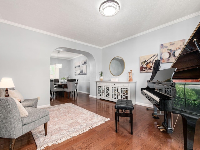 824 Lynnfield Dr, Westerville, OH 43081 - sitting room featuring arched walkways, wood finished floors, crown molding, and a textured ceiling