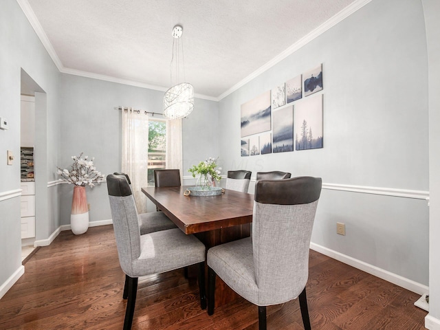824 Lynnfield Dr, Westerville, OH 43081 - dining area featuring wood finished floors, ornamental molding, a chandelier, and a textured ceiling