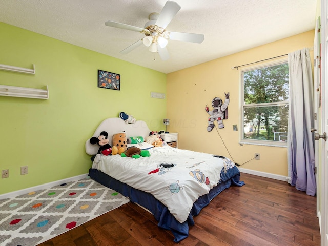824 Lynnfield Dr, Westerville, OH 43081 - bedroom with wood finished floors, ceiling fan, and a textured ceiling