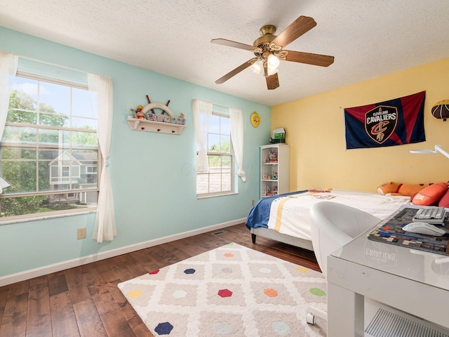 824 Lynnfield Dr, Westerville, OH 43081 - bedroom with wood-type flooring, a textured ceiling, and ceiling fan