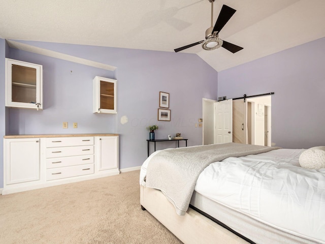 824 Lynnfield Dr, Westerville, OH 43081 - bedroom featuring lofted ceiling, light carpet, ceiling fan, and a barn door