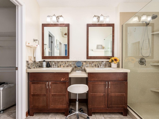 824 Lynnfield Dr, Westerville, OH 43081 - full bath featuring radiator, a shower stall, two vanities, and decorative backsplash