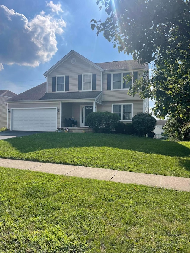 1889 Salt Lick Dr, Lancaster, OH 43130 - view of front of home featuring a front lawn, driveway, a garage, and a porch