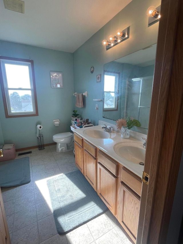 1889 Salt Lick Dr, Lancaster, OH 43130 - full bathroom with plenty of natural light, a shower stall, and double vanity