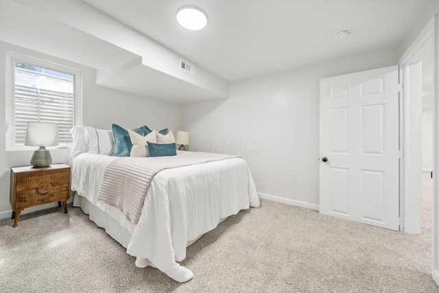 628 E Gates St, Columbus, OH 43206 - bedroom featuring light colored carpet and baseboards
