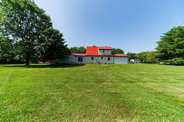 368 Woodview Dr, Chillicothe, OH 45601 - view of grassy yard with a garage