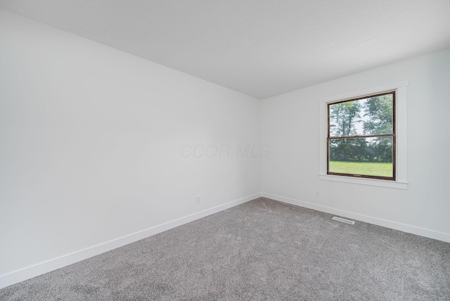 368 Woodview Dr, Chillicothe, OH 45601 - spare room featuring carpet and baseboards