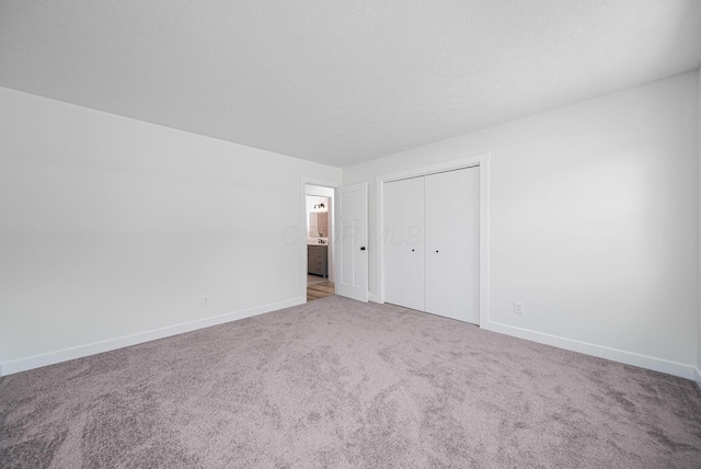 368 Woodview Dr, Chillicothe, OH 45601 - unfurnished bedroom featuring carpet floors and a closet