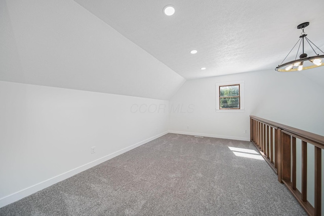 368 Woodview Dr, Chillicothe, OH 45601 - additional living space featuring carpet floors, lofted ceiling, recessed lighting, a chandelier, and a textured ceiling