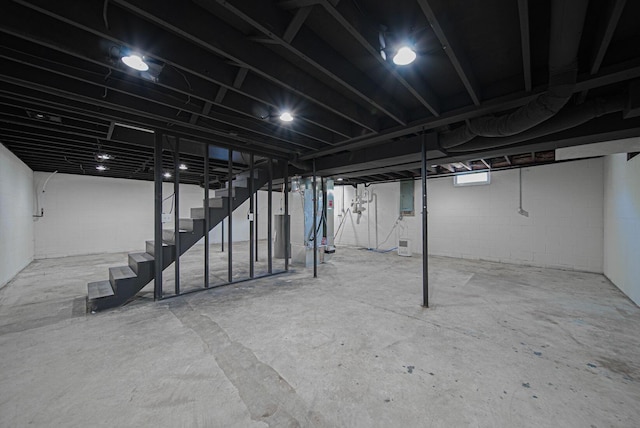 368 Woodview Dr, Chillicothe, OH 45601 - basement with stairs and concrete block wall