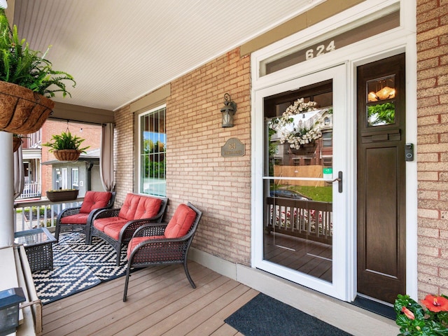 624 Oakwood Ave, Columbus, OH 43205 - entrance to property featuring a porch and brick siding