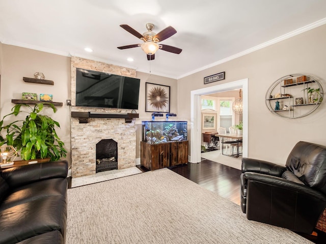 624 Oakwood Ave, Columbus, OH 43205 - living area featuring a ceiling fan, crown molding, wood finished floors, a fireplace, and recessed lighting
