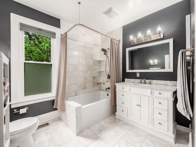 624 Oakwood Ave, Columbus, OH 43205 - bathroom with shower / tub combo with curtain, vanity, and marble look tiles
