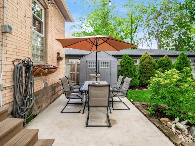 624 Oakwood Ave, Columbus, OH 43205 - view of patio / terrace with outdoor dining area and a storage shed