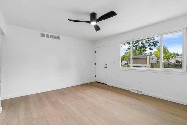 3048 Wallingford Ave, Columbus, OH 43231 - empty room featuring a ceiling fan and light wood-style flooring