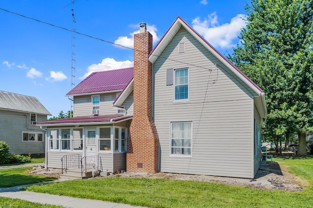 405 N Main St, Nevada, OH 44849 - back of property with a chimney and a lawn