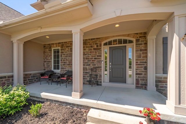 6820 Mahogany Dr, Galena, OH 43021 - property entrance with a porch and stone siding