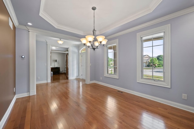 6820 Mahogany Dr, Galena, OH 43021 - empty room with a chandelier, hardwood / wood-style floors, and crown molding