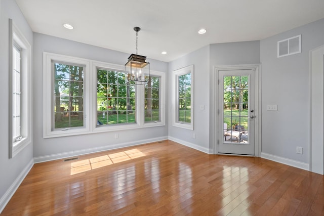 6820 Mahogany Dr, Galena, OH 43021 - unfurnished dining area featuring wood finished floors, a chandelier, and recessed lighting