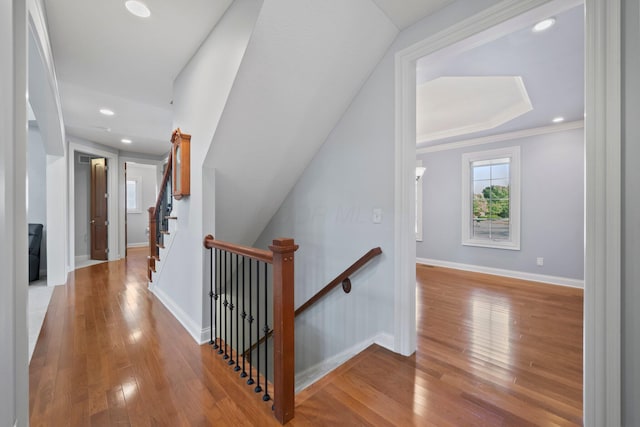6820 Mahogany Dr, Galena, OH 43021 - hallway with wood finished floors, an upstairs landing, recessed lighting, and crown molding