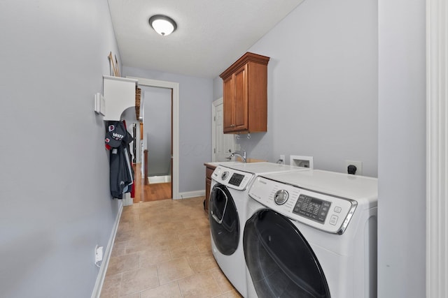 6820 Mahogany Dr, Galena, OH 43021 - laundry area featuring cabinet space and washer and clothes dryer