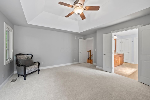6820 Mahogany Dr, Galena, OH 43021 - unfurnished room with a raised ceiling, light carpet, ceiling fan, and an upstairs landing