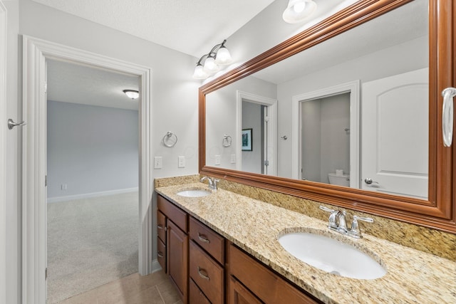 6820 Mahogany Dr, Galena, OH 43021 - full bathroom featuring double vanity and baseboards