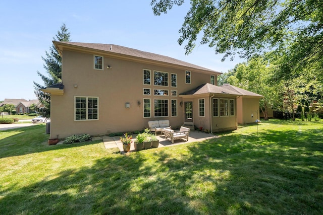 6820 Mahogany Dr, Galena, OH 43021 - rear view of house with an outdoor living space, stucco siding, a lawn, and a patio