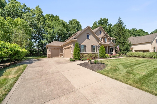 6820 Mahogany Dr, Galena, OH 43021 - traditional-style home featuring a garage, a front yard, driveway, stone siding, and stucco siding