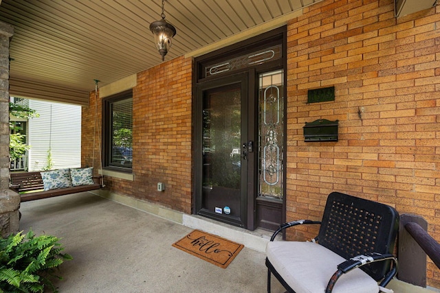 199 E Gates St, Columbus, OH 43206 - property entrance featuring brick siding and a porch