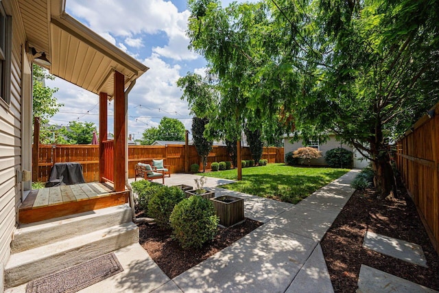199 E Gates St, Columbus, OH 43206 - fenced backyard featuring a patio area
