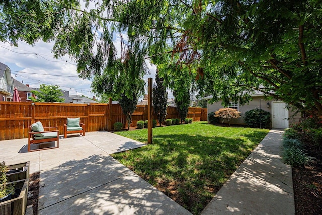 199 E Gates St, Columbus, OH 43206 - fenced backyard with a patio