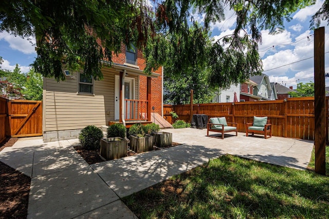 199 E Gates St, Columbus, OH 43206 - fenced backyard featuring a patio and a gate